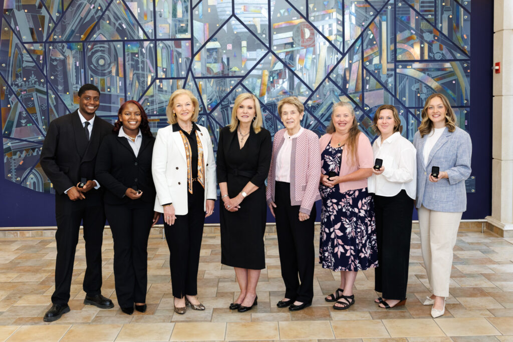 Group of 2026 Children's Healthcare of Atlanta Rural Family Therapy Scholars posing with Mercer and Children's leadership. 