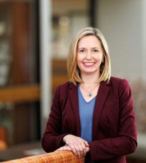 Dr. Helen King smiles in the lobby of Mercer University School of Medicine